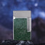 Green textured lighter with metallic frame on a dark background