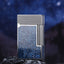Metallic lighter with textured design on a dark blue gradient background